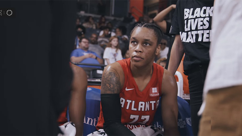 AD on the Atlanta Dream bench during a timeout