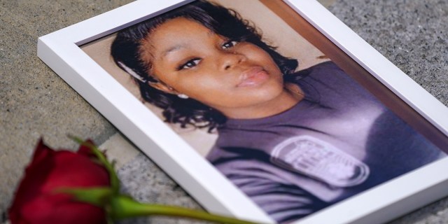 A photo of Breonna Taylor is seen among other photos of women who have lost their lives as a result of violence during the 2nd Annual Defend Black Women March in Black Lives Matter Plaza on July 30, 2022
