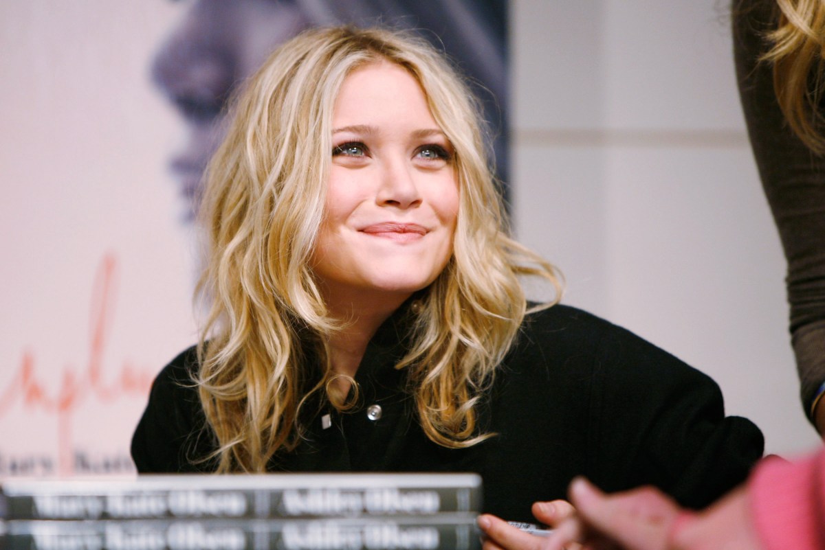 NEW YORK - OCTOBER 28: Mary-Kate Olsen attends a book signing of "Influence" at Barnes & Noble at Union Square on October 28, 2008 in New York City. Mary Kate is a white woman with blonde hair.