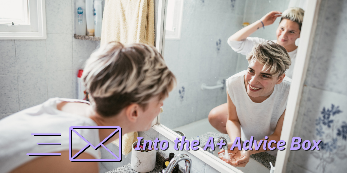 two white lesbians with short, queer haircuts, get ready in front of a bathroom mirror in the morning. they are smiling and happy