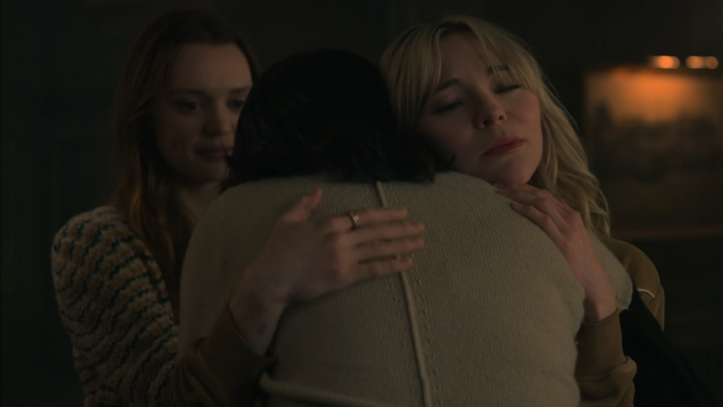 Raelle hugs Abigail while Tally looks on