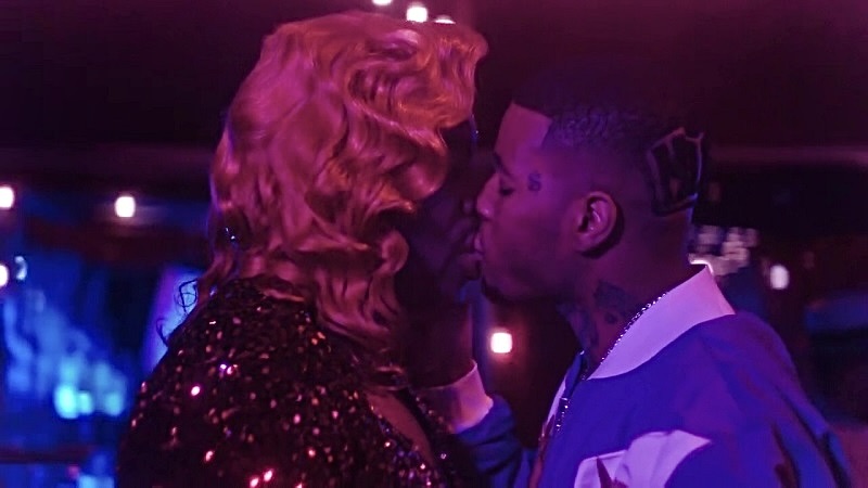Clifford and Lil' Murda share their first public kiss at a party at the Pynk.