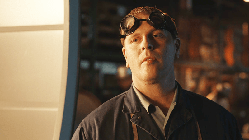 Beef talks to Max at the screw factory. 