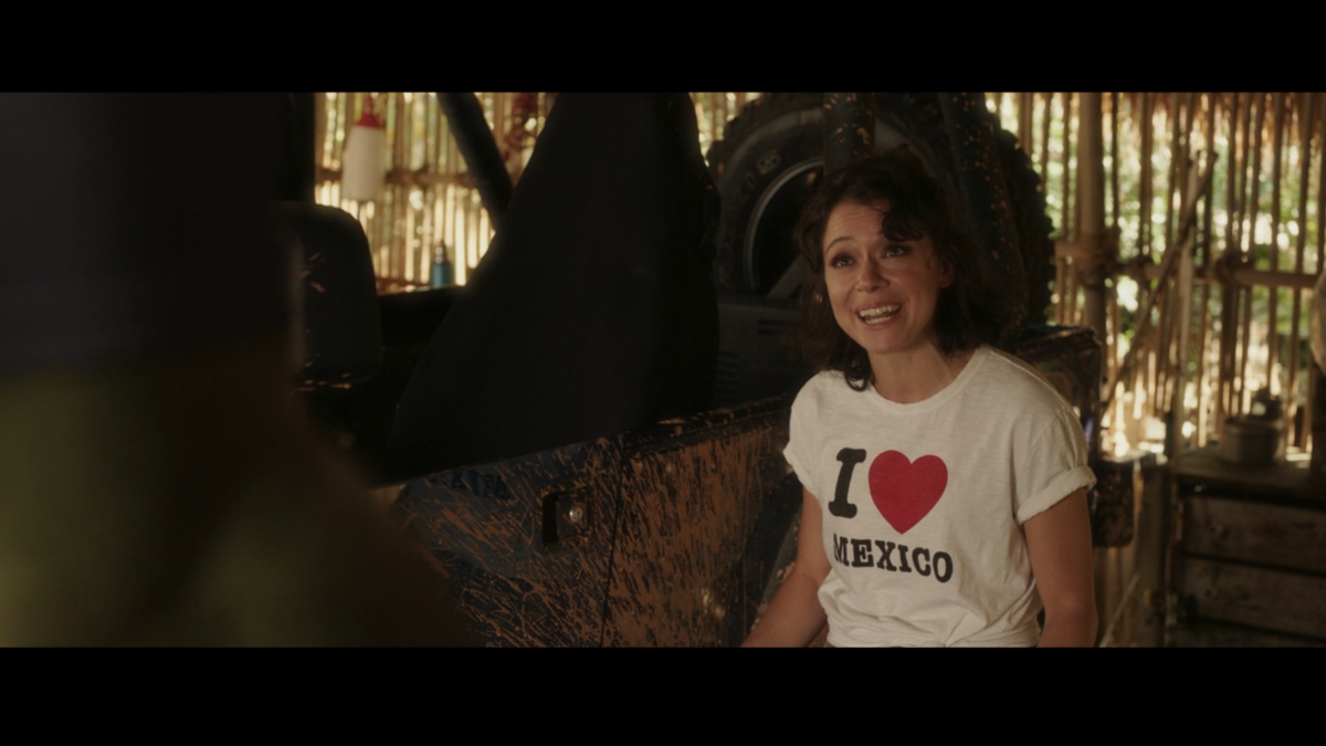 Jennifer Walters in an I <3 Mexico t-shirt smiles up at Bruce