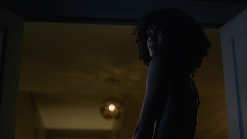 A naked Kathy (Maisie Richardson-Sellers) looks back at Saara after she's forced out of bed after their night together)