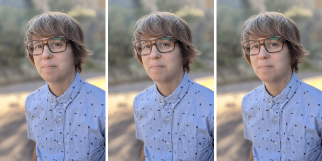 Lydia Conklin wears large rectangular framed glasses and has a swoopy short haircut and wears a shortsleeved blue buttonup.