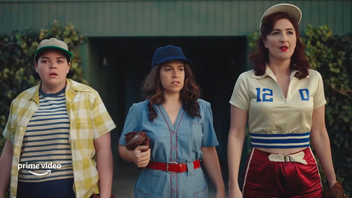 Jo, Carson, and Greta on the field in A League of Their Own
