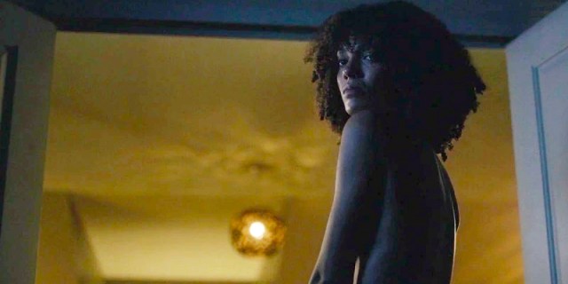 A naked Kathy (Maisie Richardson-Sellers) looks back at Saara after she's forced out of bed after their night together)