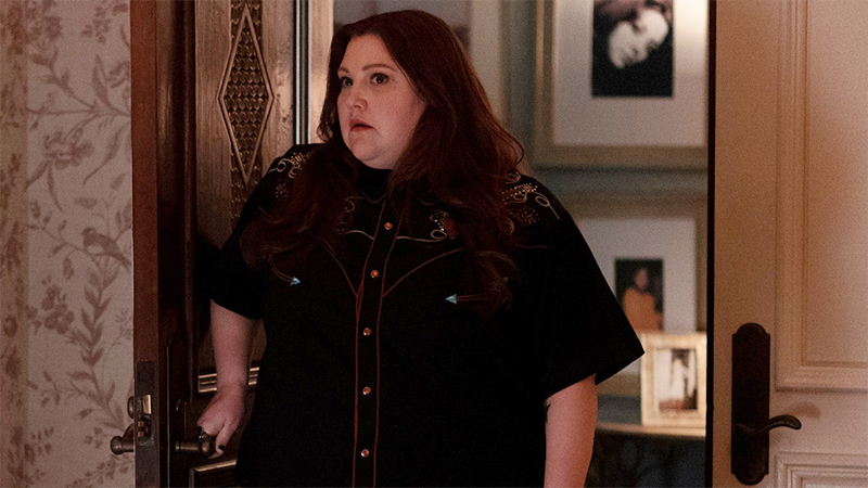 Gigi standing in the door of her mom's bedroom looking stunned