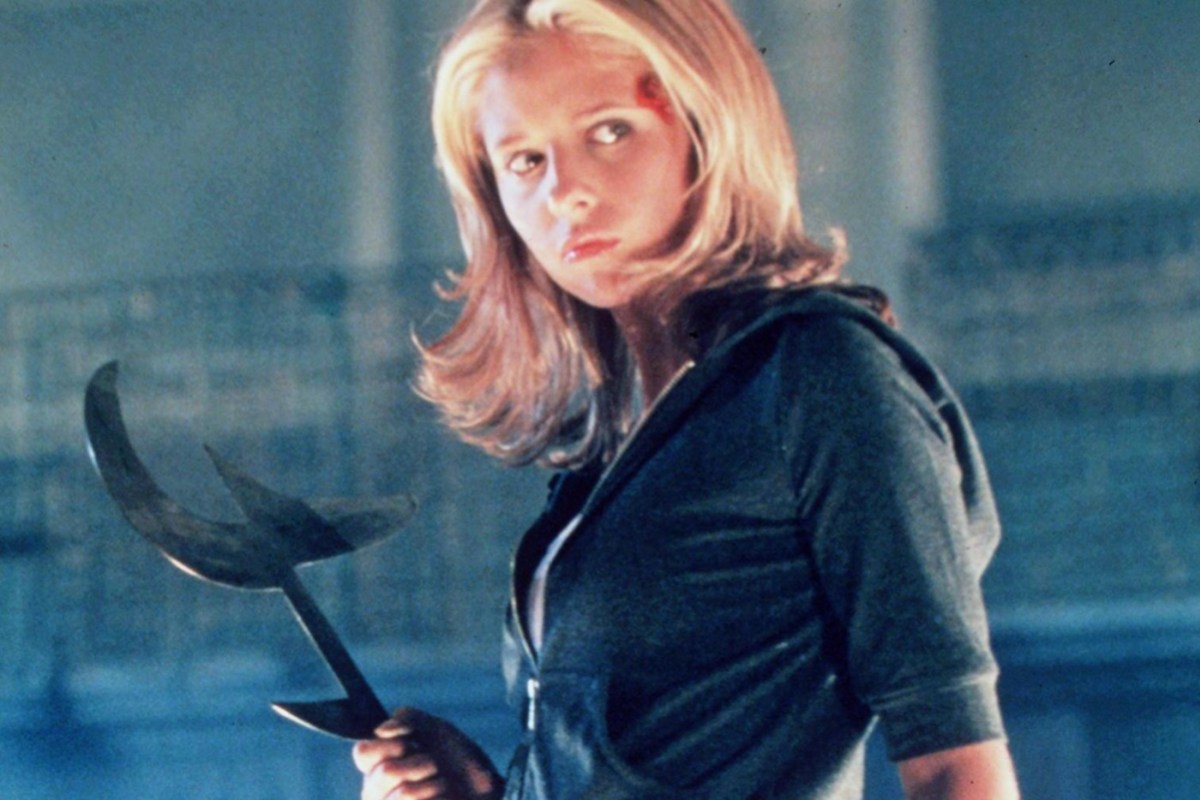 Buffy Summers in Buffy holds a weapon