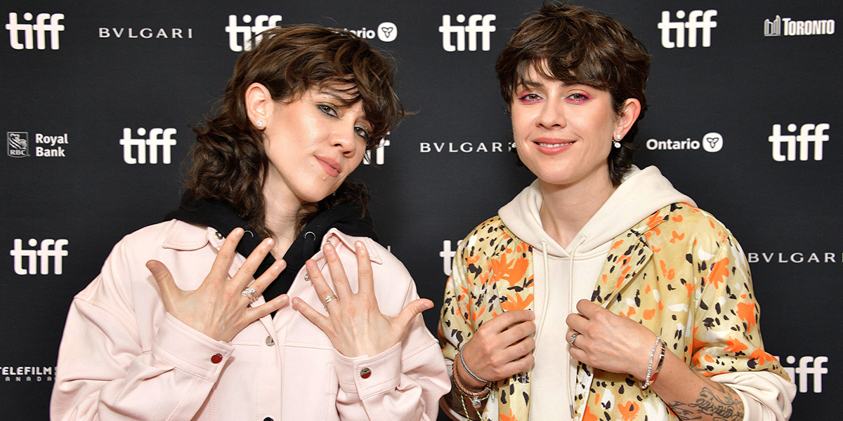 Sara Quin and Tegan Quin of Tegan And Sara attend the "High School" Premiere during the 2022 Toronto International Film Festival at TIFF Bell Lightbox
