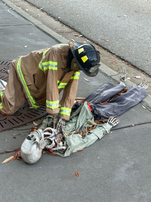 a fireman giving a skeleton CPR