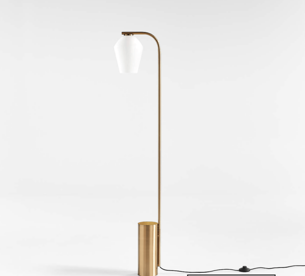 A gold floor lamp