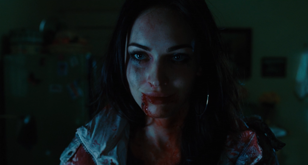 Jennifer in Jennifer's Body smiles with a bloody mouth