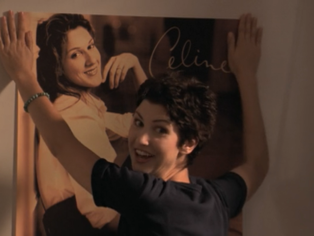 Buffy's roommate Kathy, putting up a poster of Celine Dion