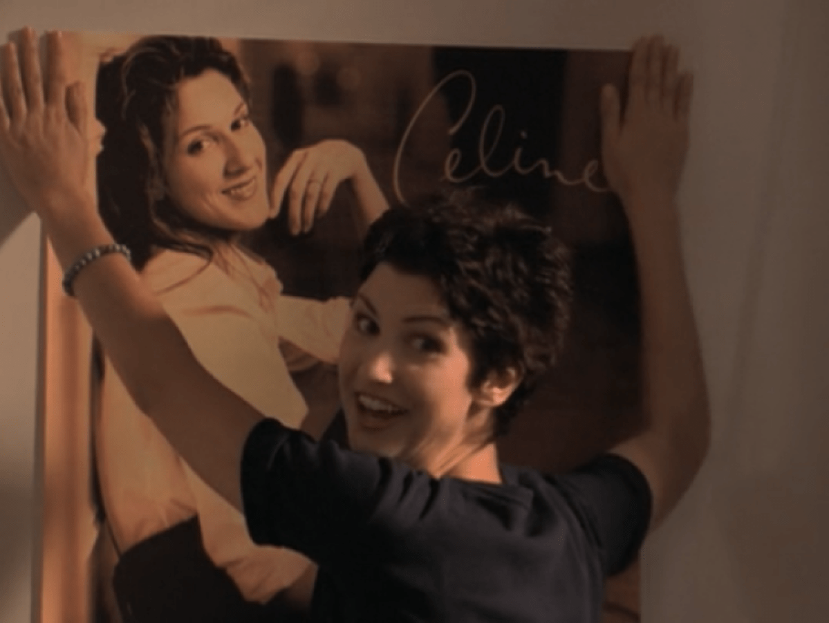 Buffy's roommate Kathy posing a Celine Dion poster