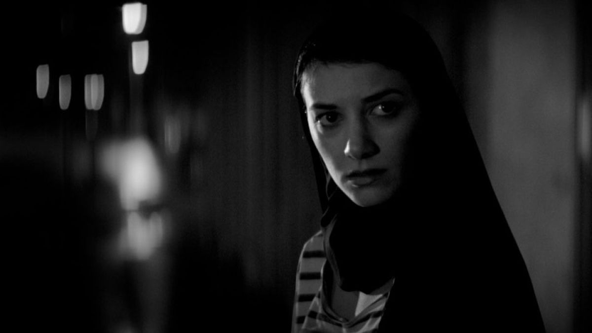The Girl in A Girl Walks Home Alone At Night in black and white