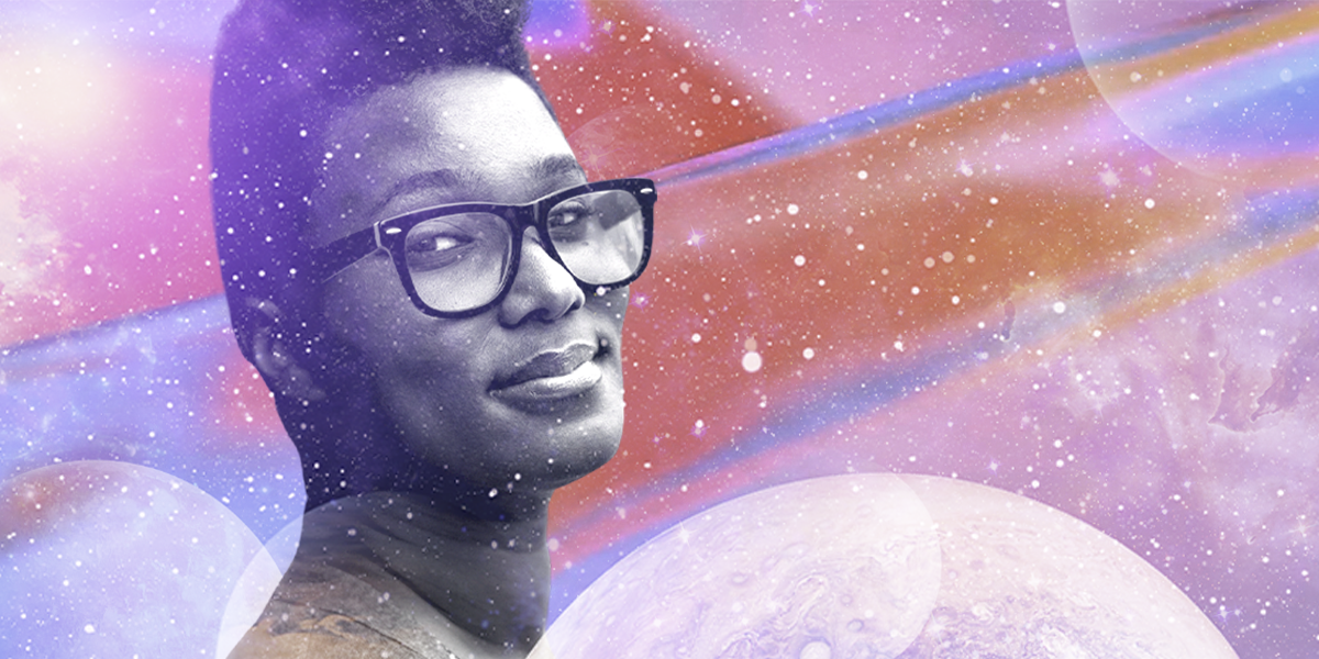 Sa'iyda looks at the viewer, smiling, in front of a colorful space themed background. Sa'iyda is a Black woman with short hair and glasses.