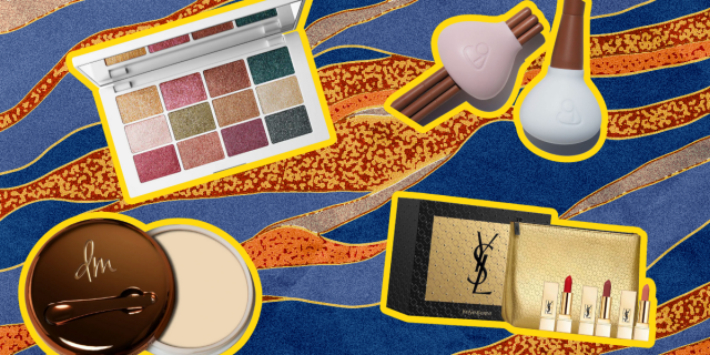 Foundation, a metallic eye shadow palette, makeup brush cleaners, a YSL lipstick set