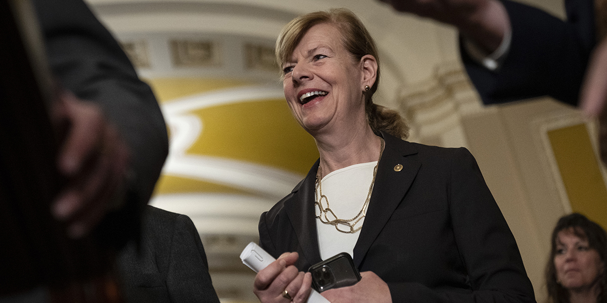 WASHINGTON, DC - NOVEMBER 29: Sen. Tammy Baldwin (D-WI) smiles during a news conference after a meeting with Senate Democrats at the U.S. Capitol November 29, 2022 in Washington, DC. The Senate is expected to pass the the Respect for Marriage Act on Tuesday night, which will enshrine marriage equality into federal law. (Photo by Drew Angerer/Getty Images)