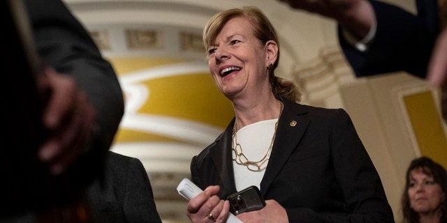 WASHINGTON, DC - NOVEMBER 29: Sen. Tammy Baldwin (D-WI) smiles during a news conference after a meeting with Senate Democrats at the U.S. Capitol November 29, 2022 in Washington, DC. The Senate is expected to pass the the Respect for Marriage Act on Tuesday night, which will enshrine marriage equality into federal law. (Photo by Drew Angerer/Getty Images)