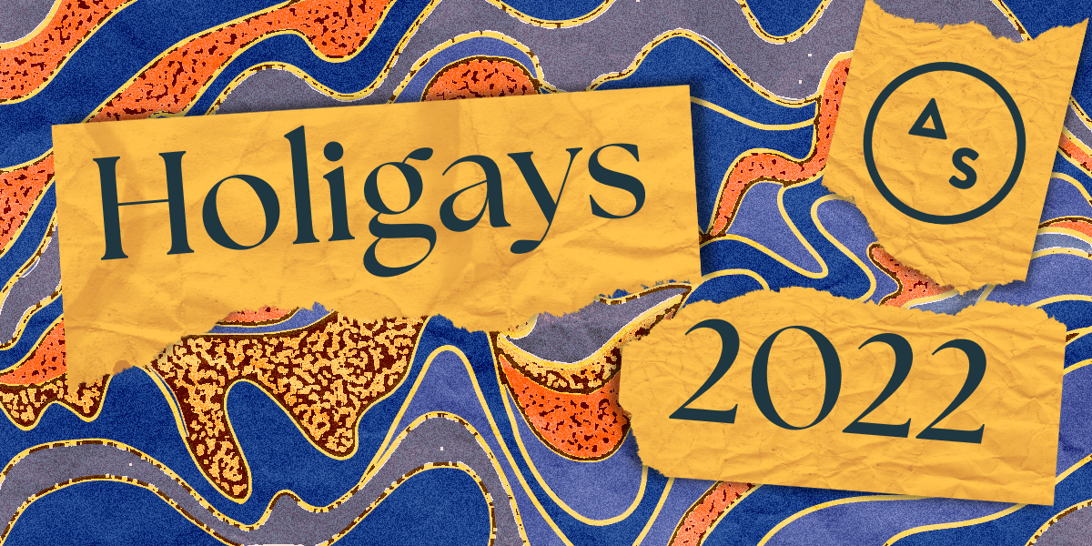 A swirly background in blues, oranges, and golds. The words HOLIDAYS 2022 are on torn gold paper, along with the Autostraddle logo.