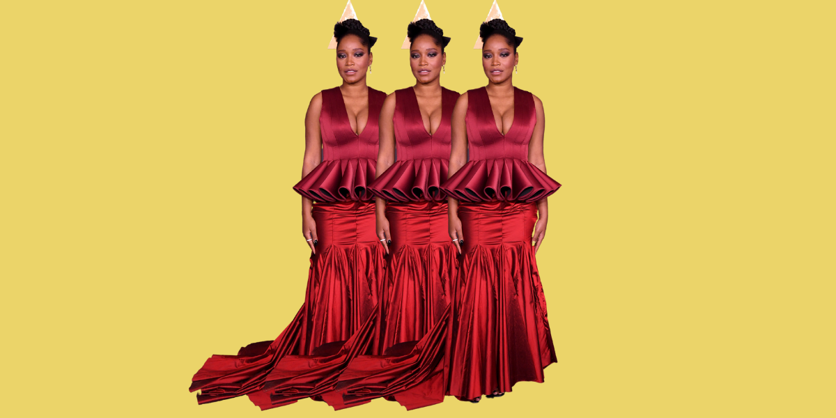 Keke Palmer wears a long shiny red dress