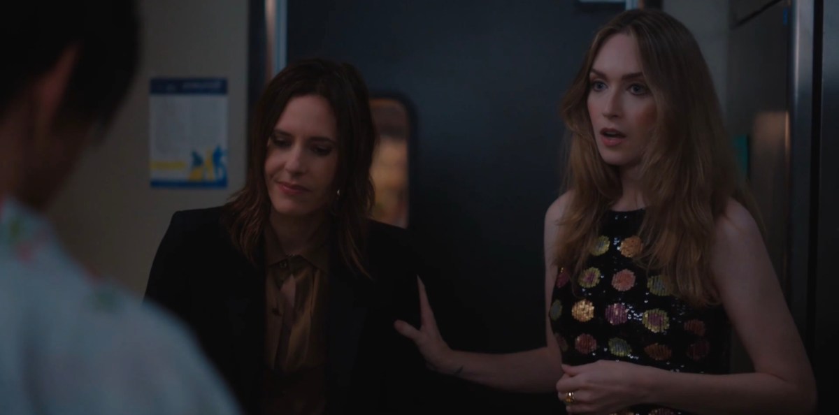 Tess puts her hand on Shane's arm 