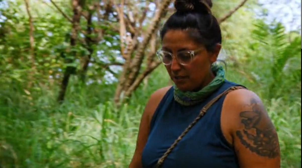 Karla Cruz Godoy walks through the jungle on Survivor, Season 43