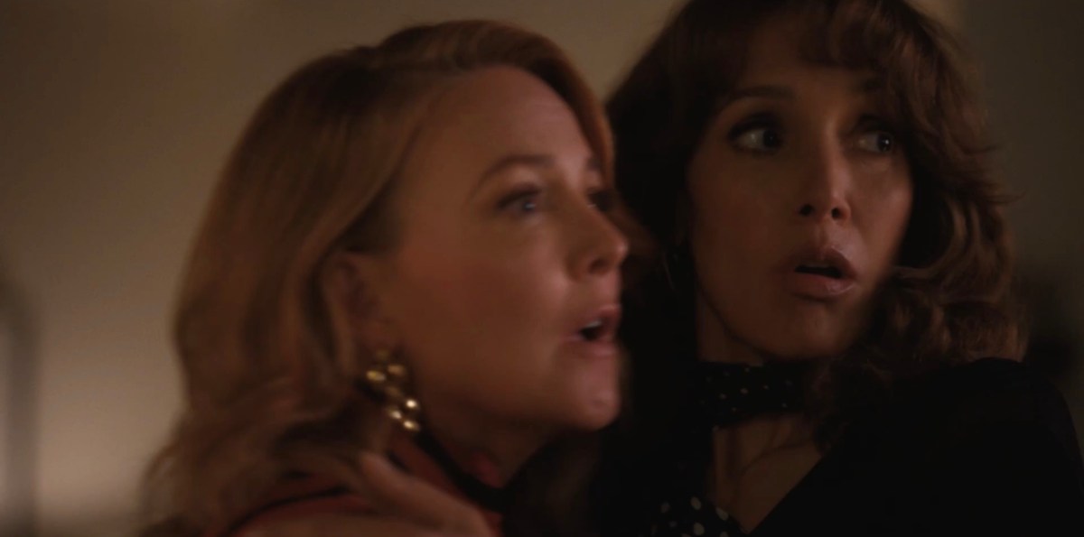 Bette and Tina break apart from each other to see Angie through the door