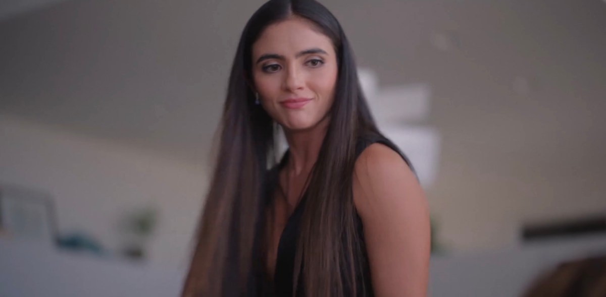 Dani looking down at Gigi