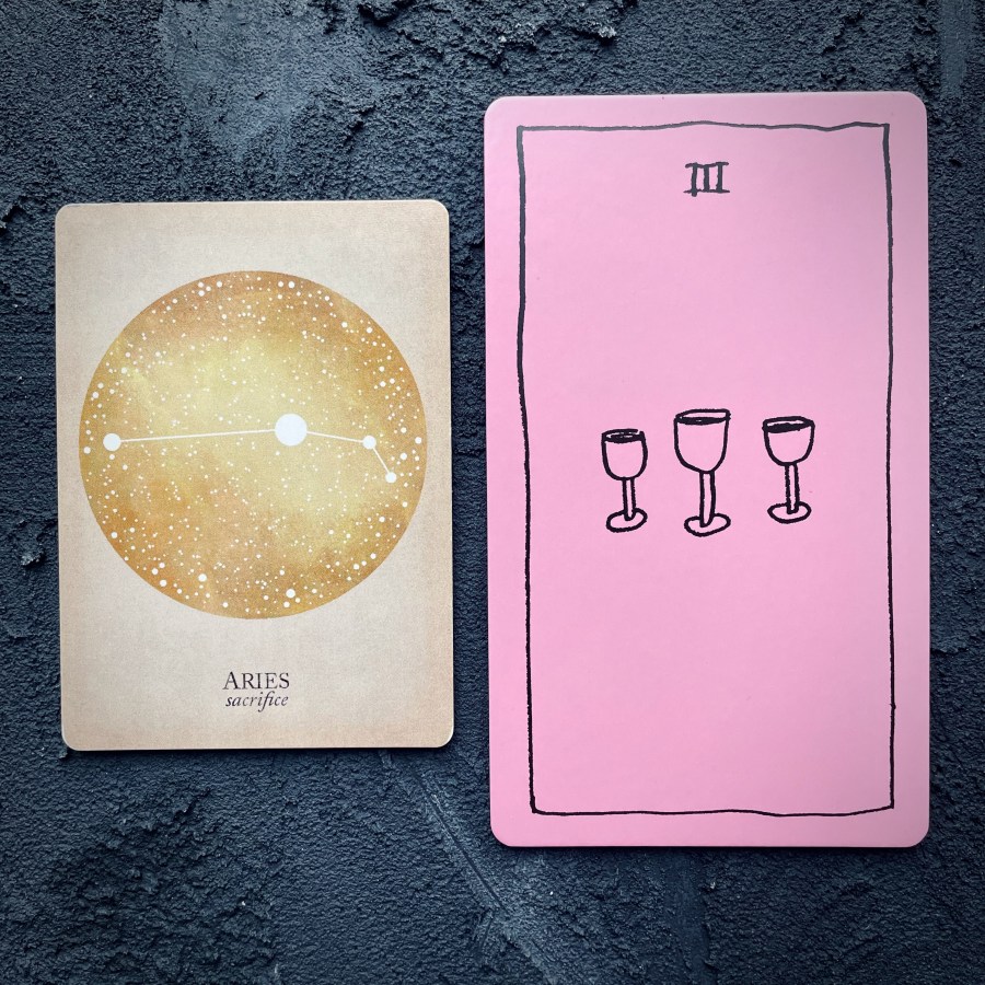 Card 1: Aries, Card 2: Three of cups