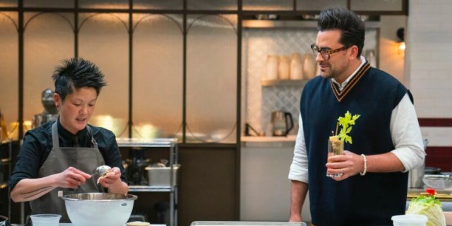 Dan Levy, with a bloody Mary, talking to chef J Chong on The Big Brunch