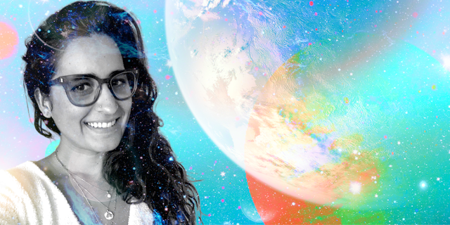 Kayla is set in black and white against a colorful spacey background. She is a South Asian woman with long brown hair and glasses who is smiling. She has a couple of soft pieces of jewelry on, too.