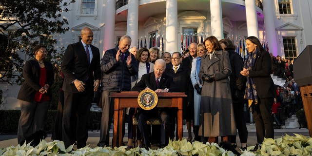 WASHINGTON, DC - DECEMBER 13: U.S. President Joe Biden signs the Respect for Marriage Act on the South Lawn of the White House on December 13, 2022 in Washington, DC. The Respect for Marriage Act will codify same-sex and interracial marriages. (Photo by Drew Angerer/Getty Images)