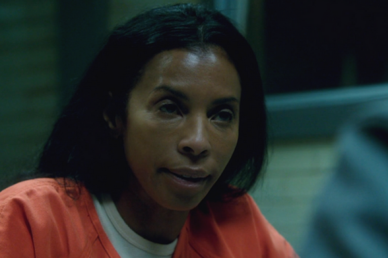 Maya Lewis on Scandal wearing a prison jumpsuit