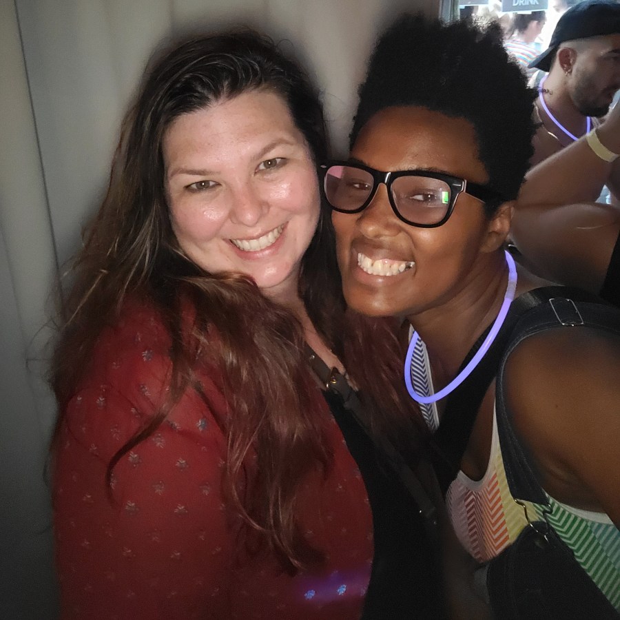 Sai and a friend posing together at NYC Pride