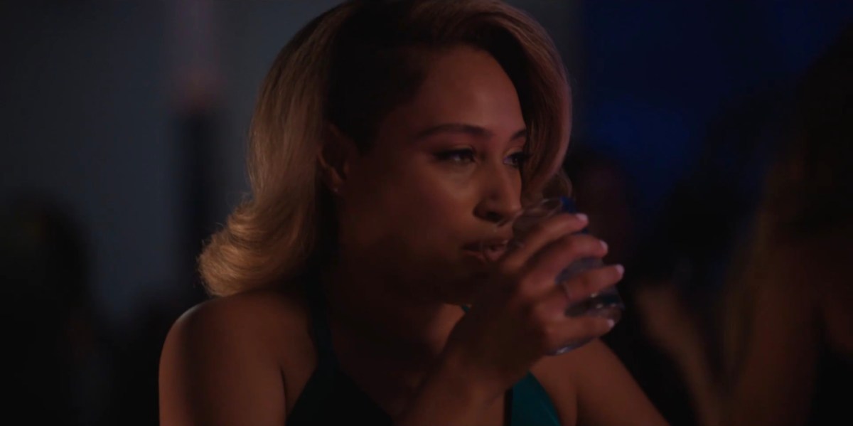 Sophie takes a drink