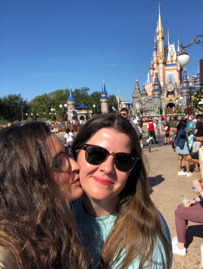 Kayla kissing Kristen in Orlando