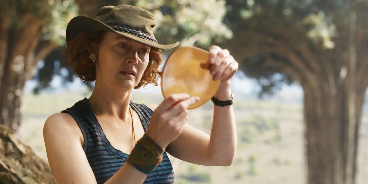 Dr. Mary Malone looks at Dust through the Amber Spyglass