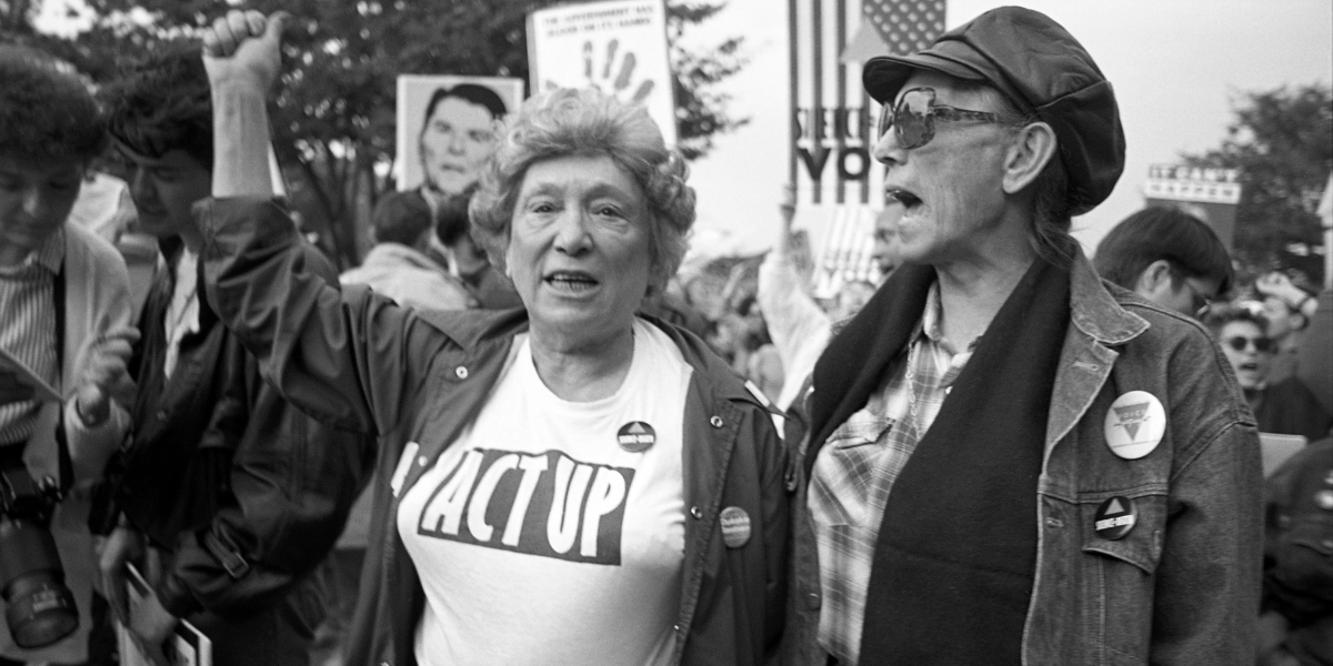 Two protesters with Act Up march in 1988