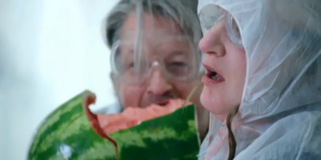 A woman eating a watermelon on the TV show Taskmaster
