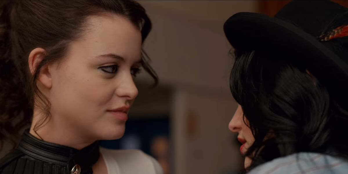 Screenshot from Ginny & Georgia Season 2: Lesbians Max and Silver exchange a charged look