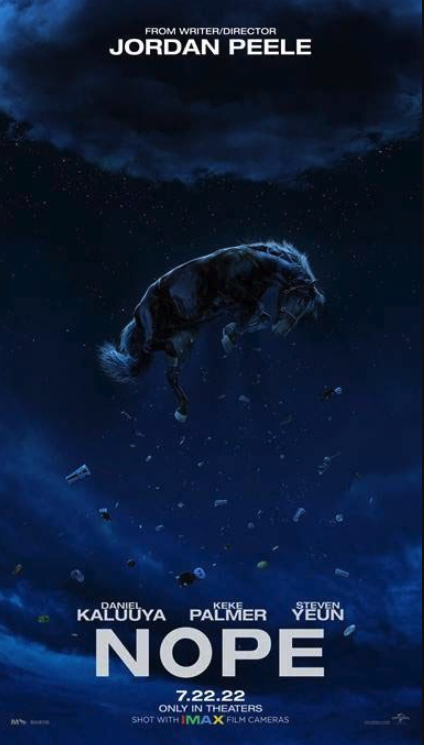 the cover of nope featuring a cow being drawn up toward a dark starry sky