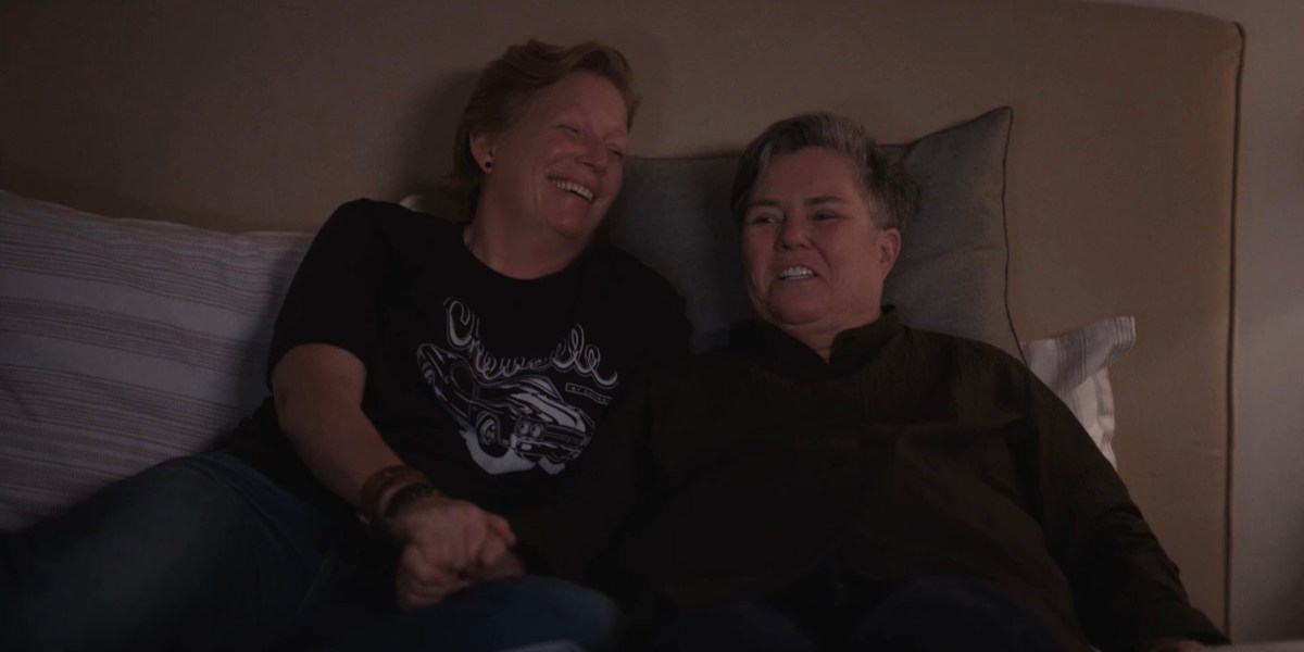 Carrie and Misty laughing in bed