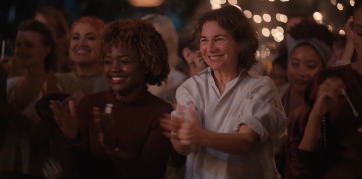 Ilene Chaiken clapping in the wedding party