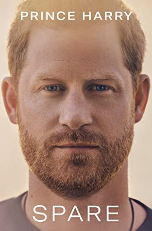 a big ol photo of prince harry with the word "spare" on his neck