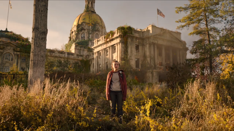 The Last of Us: Ellie stands in front of a burning Capitol building