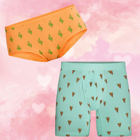 Against a white and pink background covered in hearts, there are orange briefs covered in a cactus print in the upper left corner of the image. In the bottom right corner, there are light blue boxer briefs covered in pizza print.