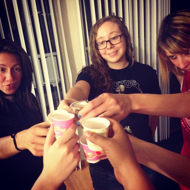 alex, rachel and riese cheersing with dixie cups